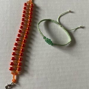 Acrylic, faux orange pearl and rice bead, green cat eye bead macrame bracelet